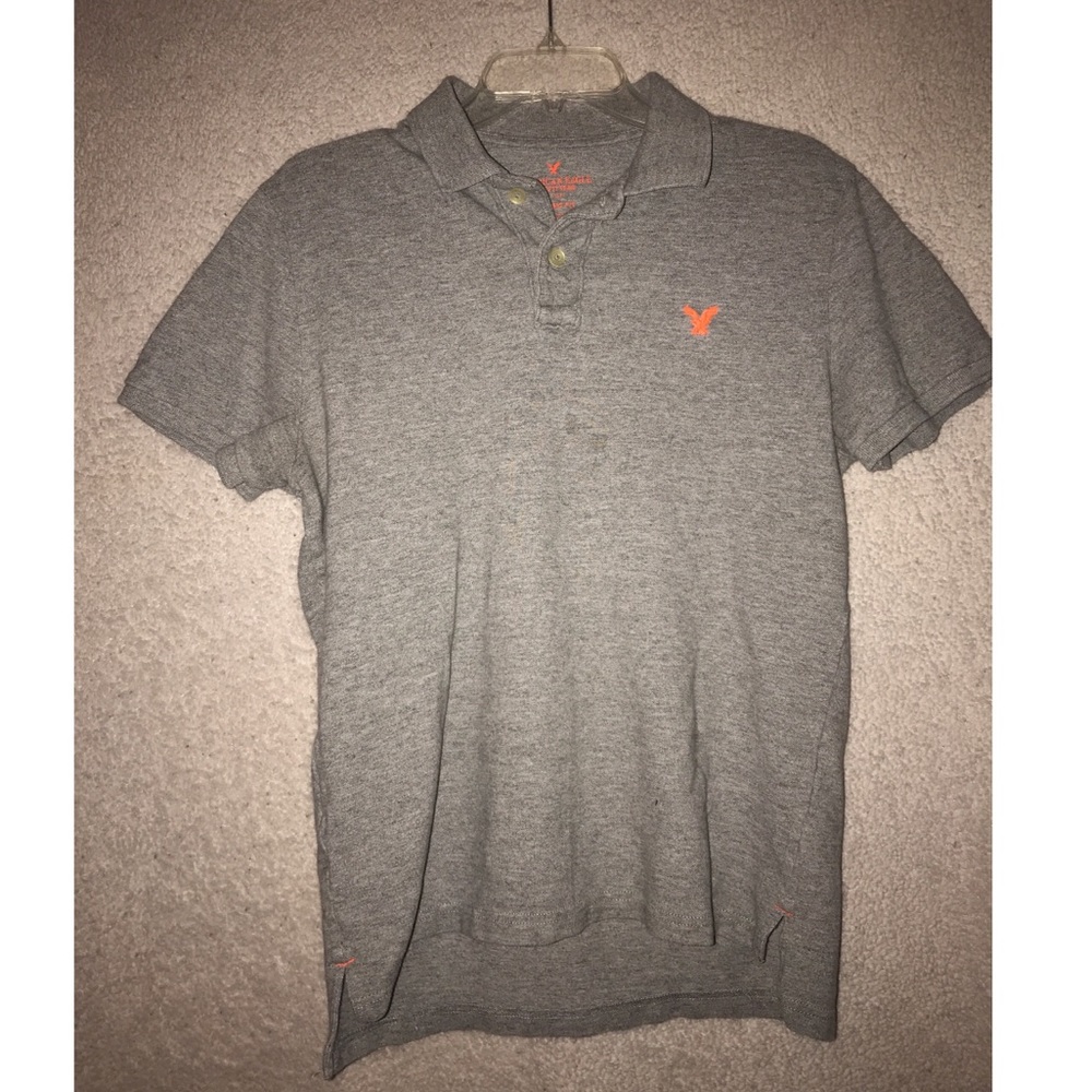 Grey polo with orange details